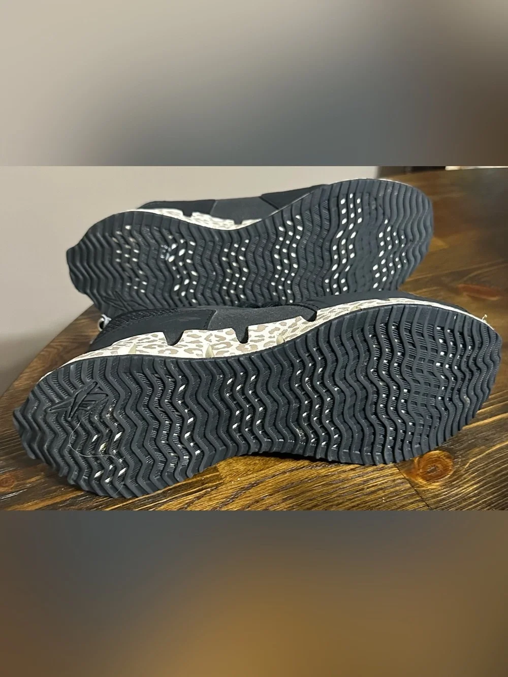Reebok Black Athletic Sneakers with Leopard-Print Sole